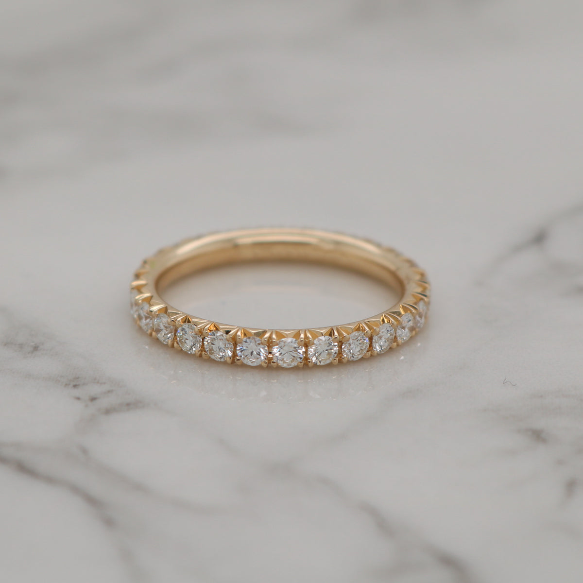 French pavé diamond store eternity ring