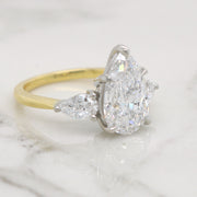 3 Stone Pear with Two Tone Setting