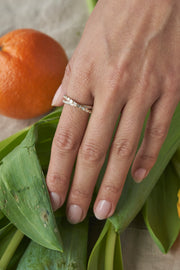 Cross Over Round and Baguette Diamond Ring