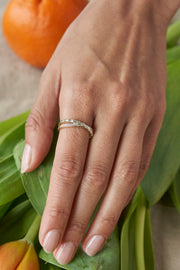 Cross Over Round and Baguette Diamond Ring