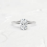 hidden-halo-oval-engagement-ring#metal_platinum
