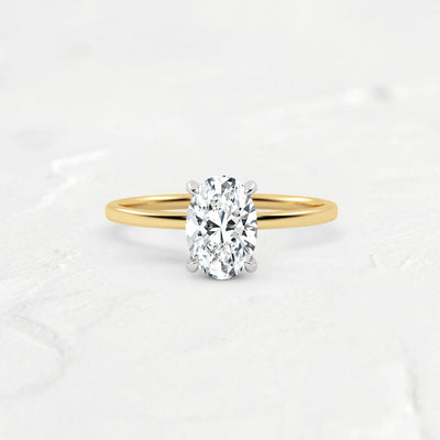 hidden-halo-oval-engagement-ring#metal_18k-yellow-gold-w-platinum-head