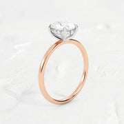 hidden-halo-oval-engagement-ring#metal_18k-rose-gold-w-platinum-head