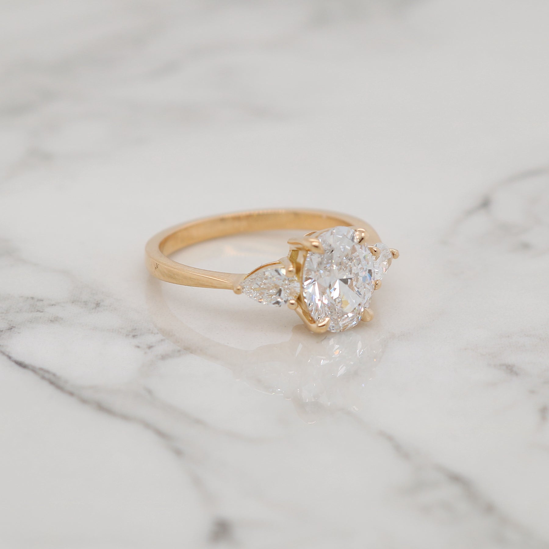 2ct Oval Stone with Matching Pear Shapes Engagement Ring – Siroo