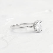 hidden-halo-oval-engagement-ring#metal_18k-white-gold